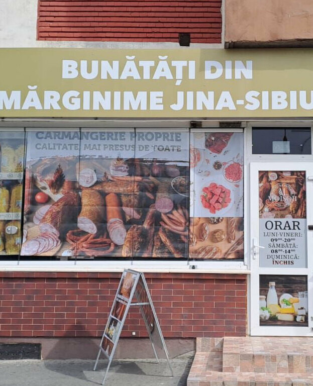 caseta luminoasa sibiu realizata pentru carmangerie amplasata pe bulevard central vizibilitate maxima trafic intens productie si montaj profesional iluminare led durabila